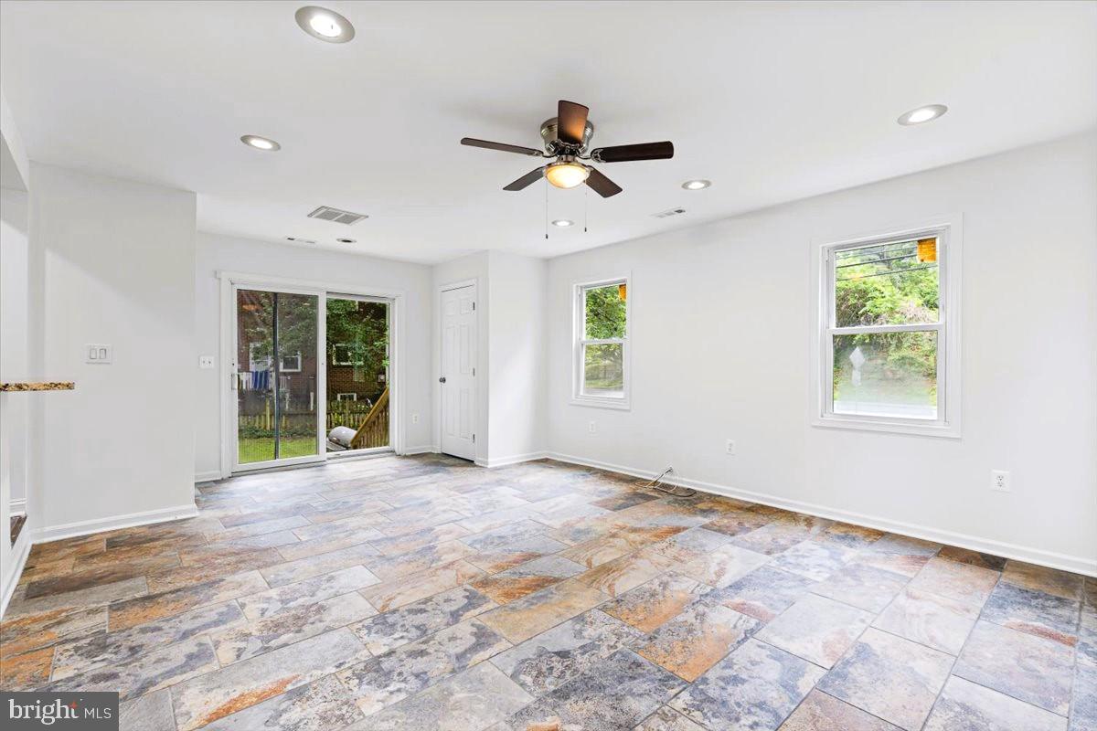 5901 Euclid Street Cheverly, MD 20785 - Photo 9 of 36 Great room opens to fenced rear yard