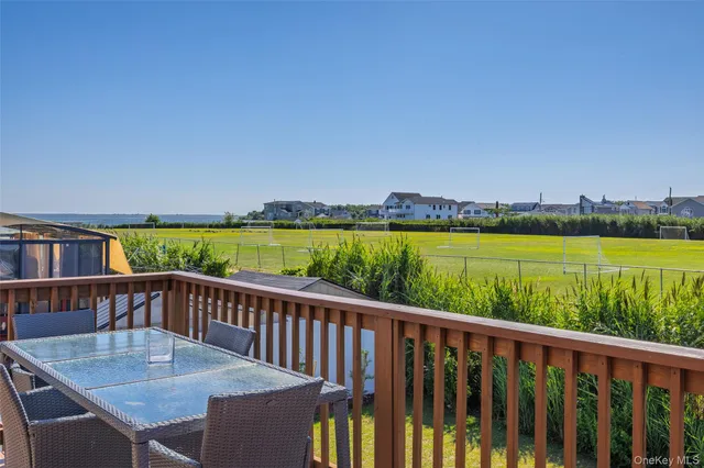 a view of a balcony with city view