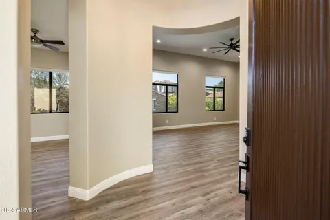 wooden floor in a hall with an entryway
