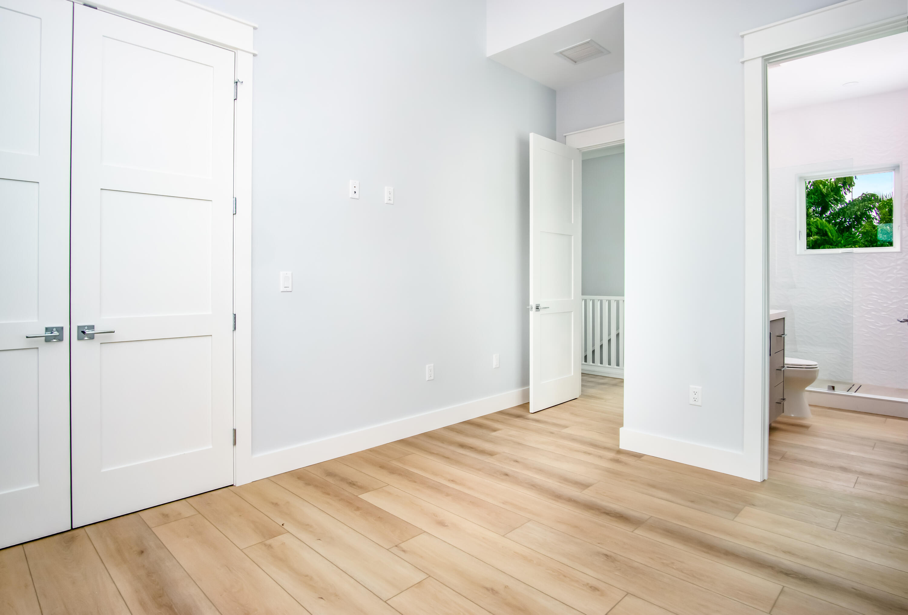105 Carroll Street, Unit 6 Islamorada, FL 33036 - Photo 15 of 31 a view of an empty room with wooden floor