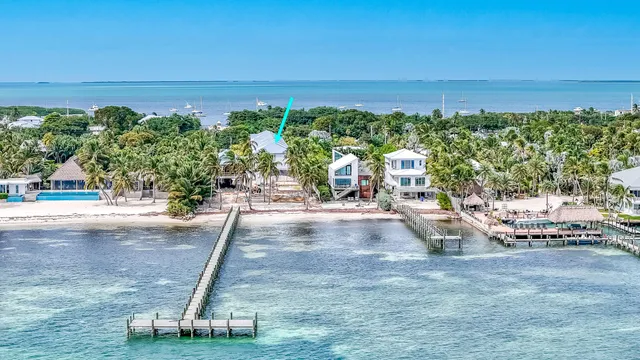 a view of a swimming pool with an outdoor space and seating area