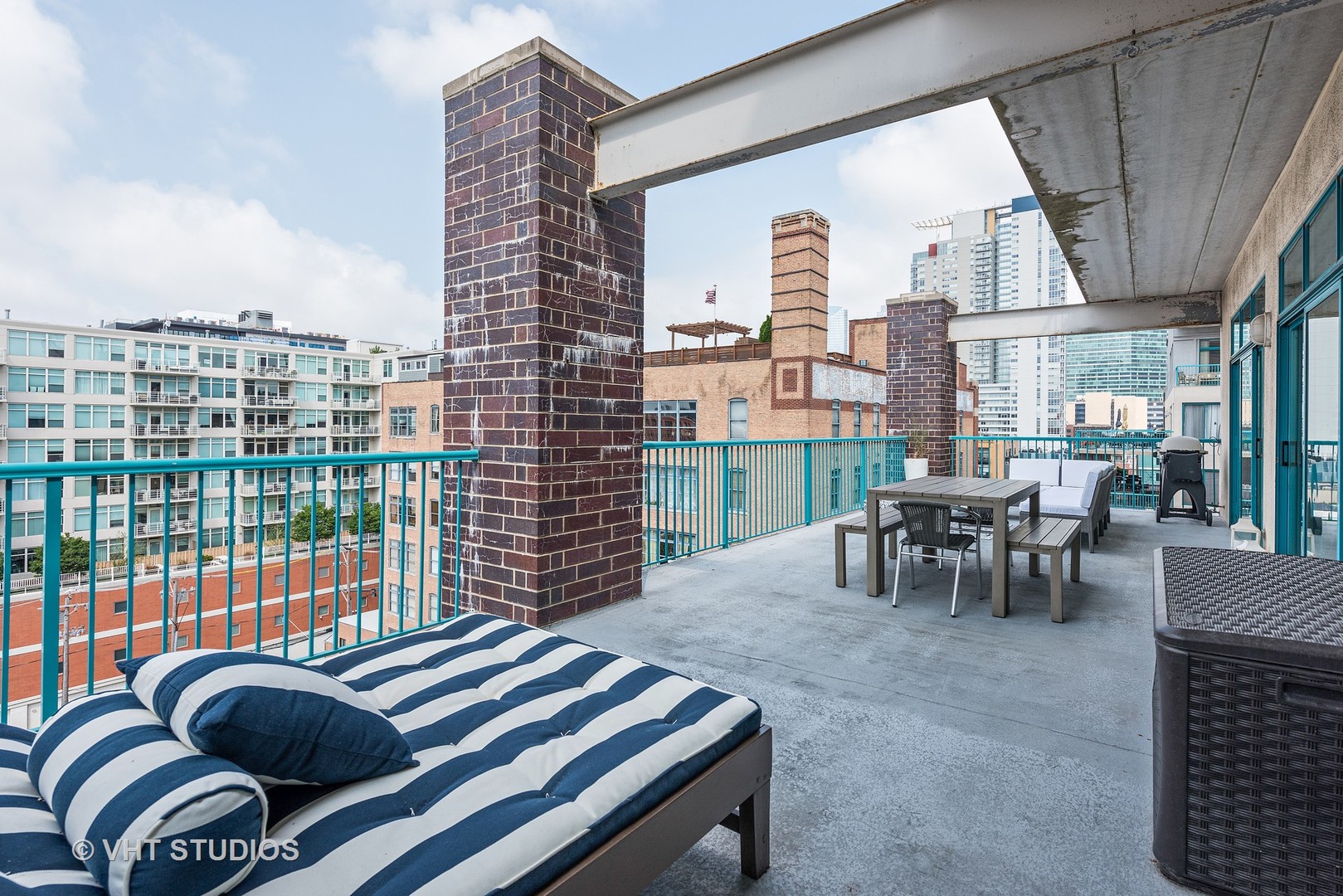 920 West Madison Street, Unit F8 Chicago, IL 60607 - Photo 11 of 14 a bedroom with furniture and a large window