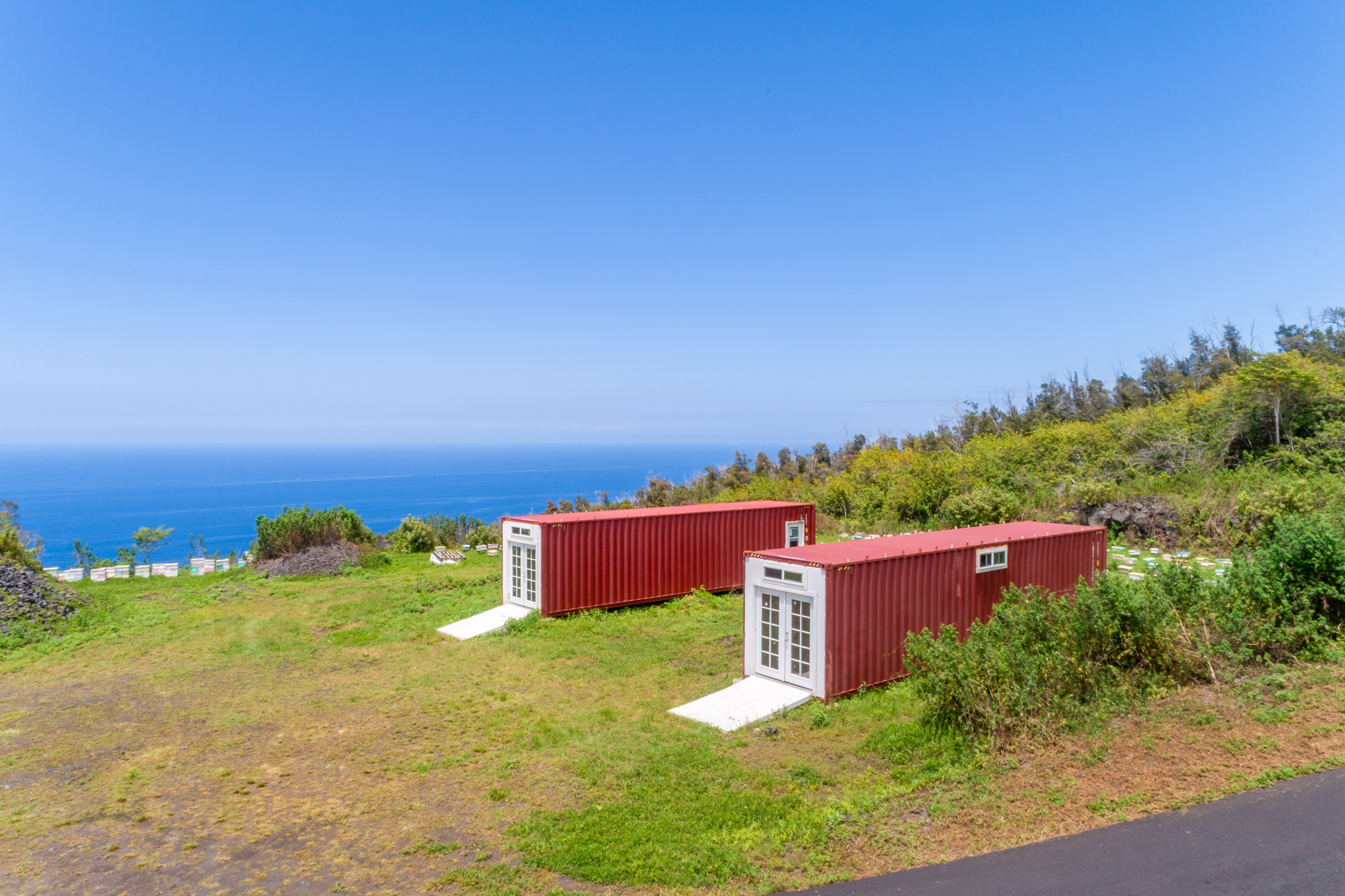 87-2793 Hawaii Belt Road Captain Cook, HI 96704 - Photo 26 of 30 an aerial view of a house with a yard