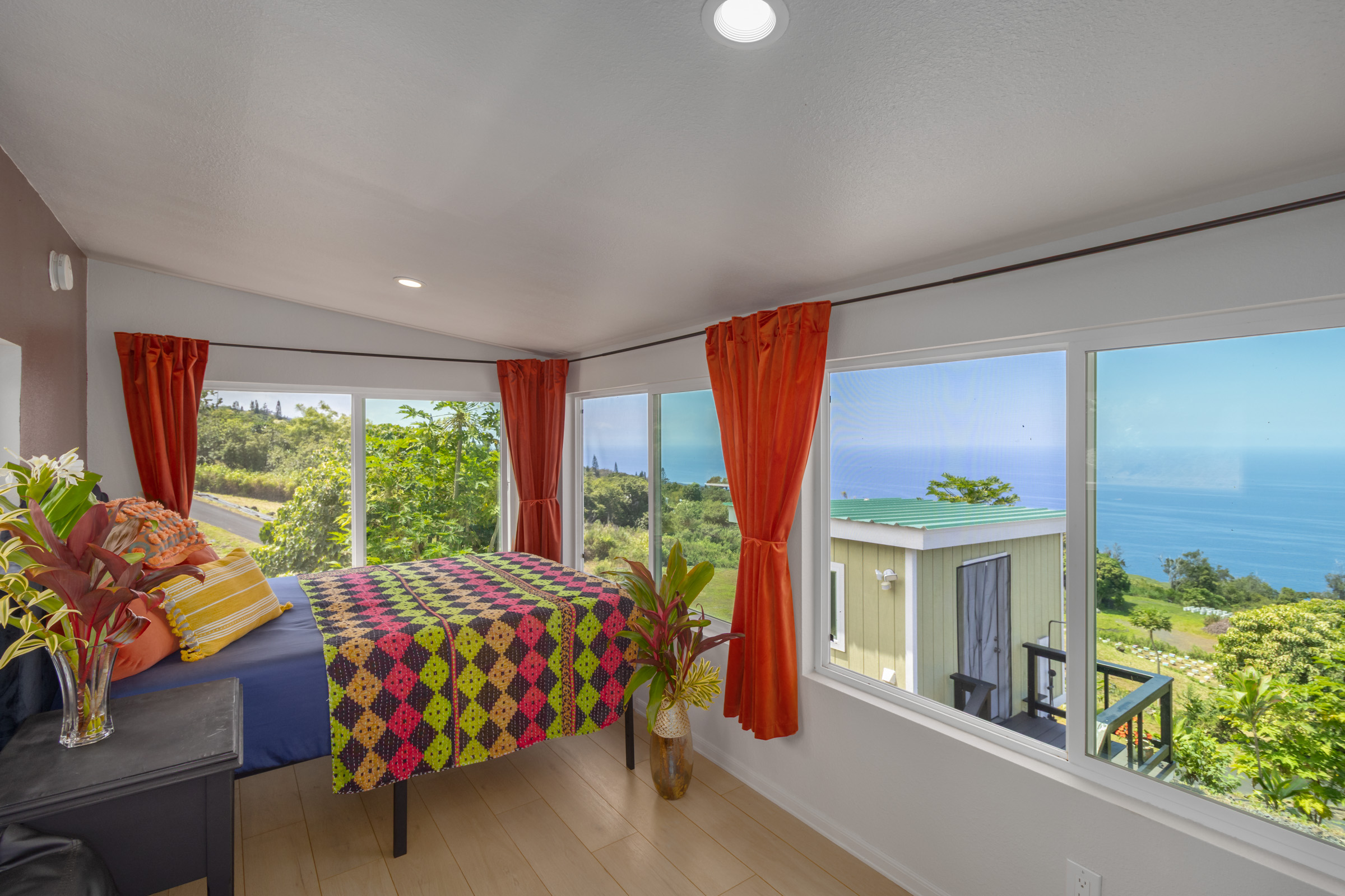 87-2793 Hawaii Belt Road Captain Cook, HI 96704 - Photo 8 of 30 a bed room with a bed and a window