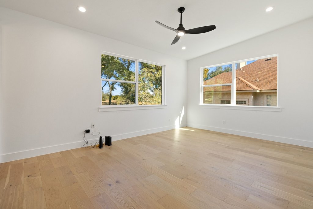 47 War Bonnet Wimberley, TX 78676 - Photo 30 of 40 an empty room with windows and fan