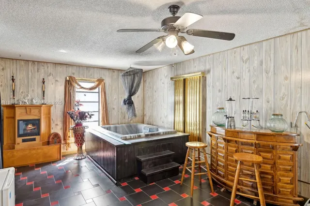 a room with lots of table and chairs