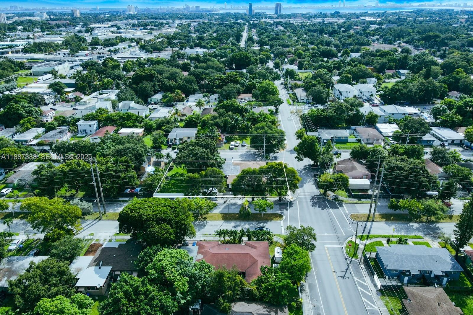 469 Northwest 69th Street Miami, FL 33150 - Photo 32 of 39 an aerial view of a houses with a yard