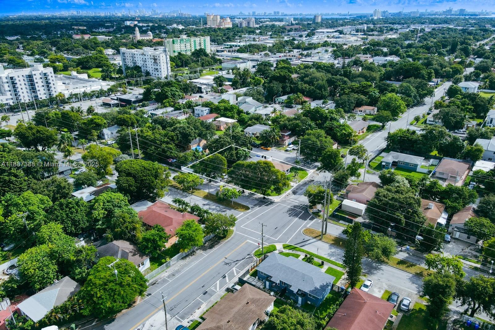 469 Northwest 69th Street Miami, FL 33150 - Photo 34 of 39 an aerial view of a houses with a yard