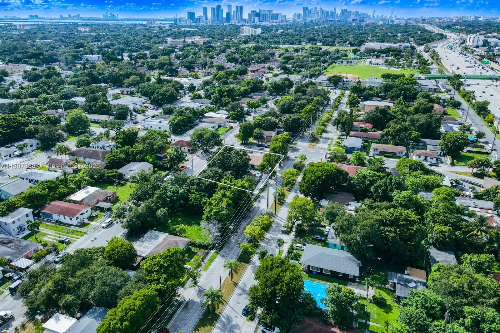 469 Northwest 69th Street Miami, FL 33150 - Photo 35 of 39 an aerial view of residential houses with outdoor space and trees
