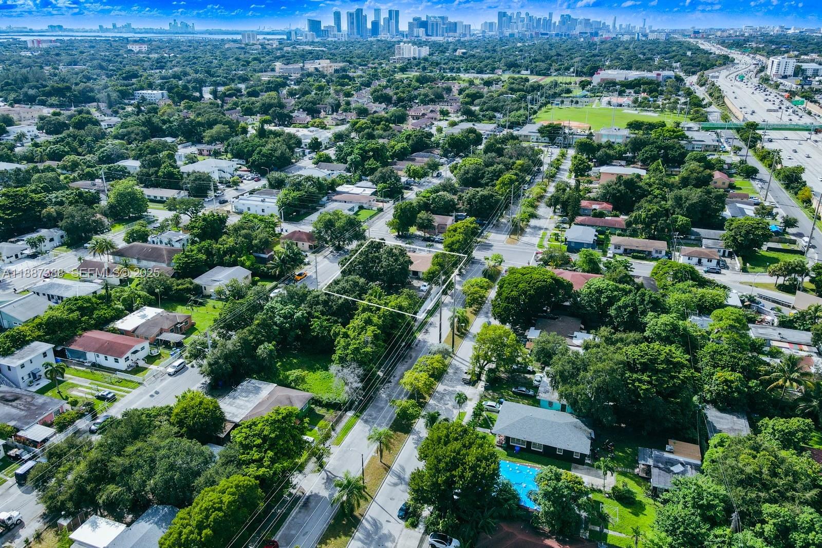 469 Northwest 69th Street Miami, FL 33150 - Photo 35 of 39 an aerial view of residential houses with outdoor space and trees