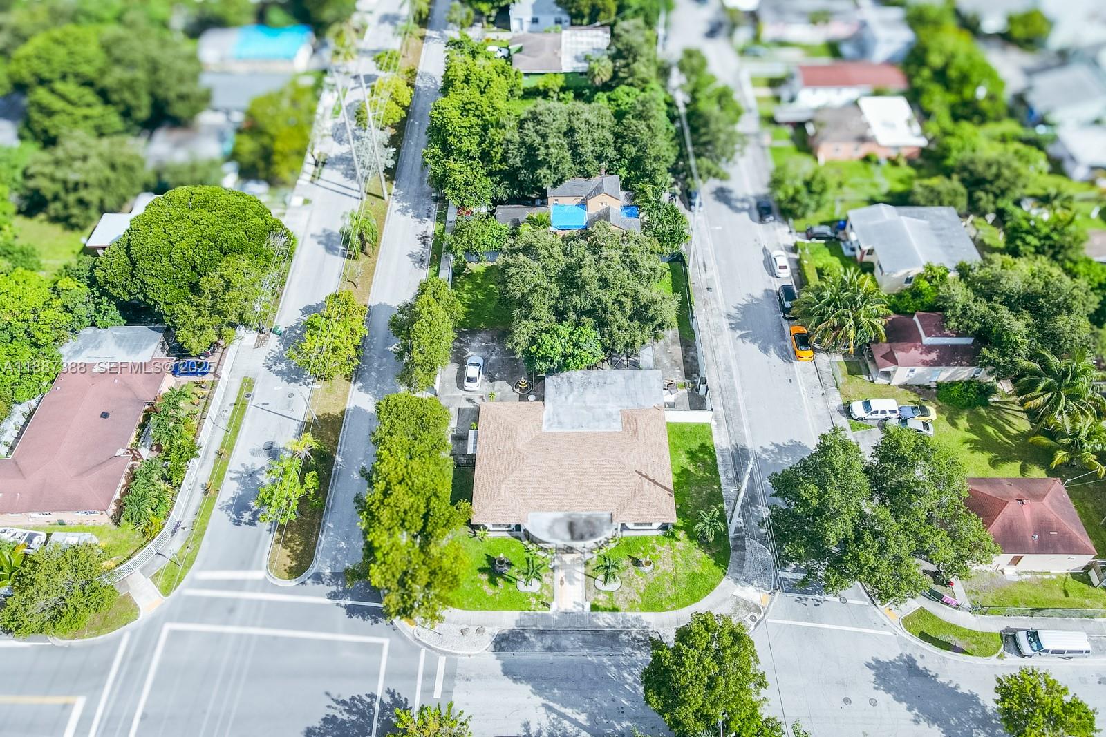 469 Northwest 69th Street Miami, FL 33150 - Photo 36 of 39 an aerial view of residential house with outdoor space and street view