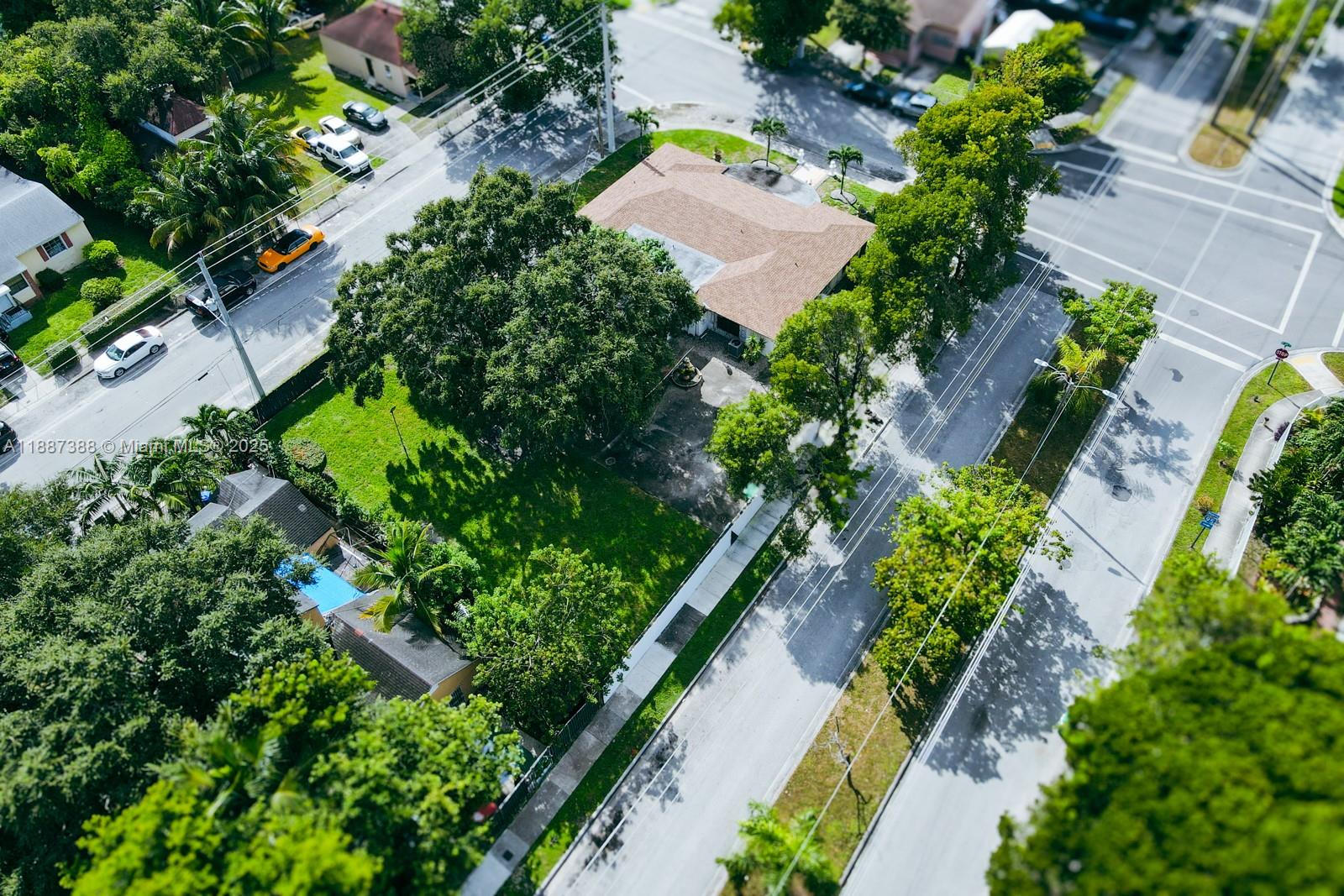 469 Northwest 69th Street Miami, FL 33150 - Photo 38 of 39 an aerial view of a house with a yard