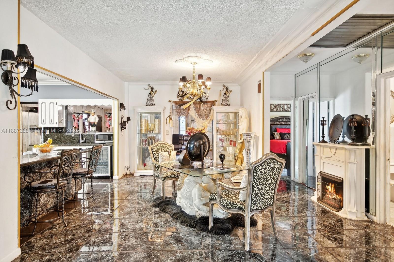 469 Northwest 69th Street Miami, FL 33150 - Photo 6 of 39 a view of a livingroom with furniture and a fireplace