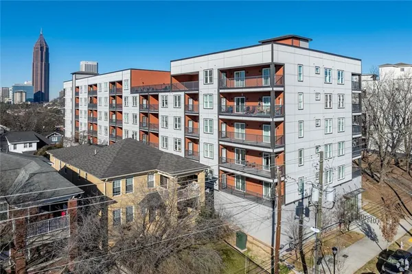 a front view of a building with glass windows