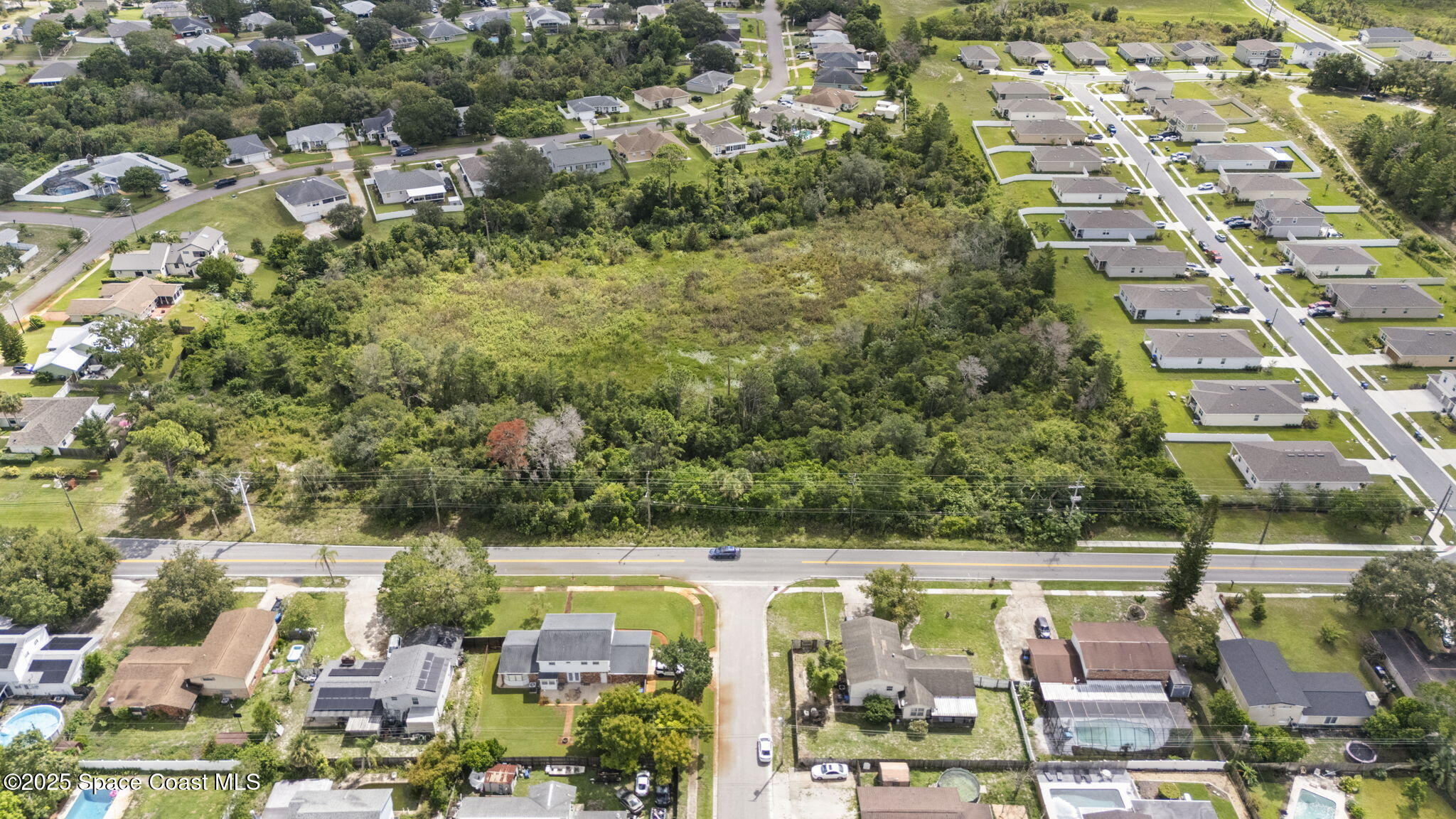 0 North Carpenter Road Titusville, FL 32796 - Photo 12 of 12 an aerial view of residential building and parking space