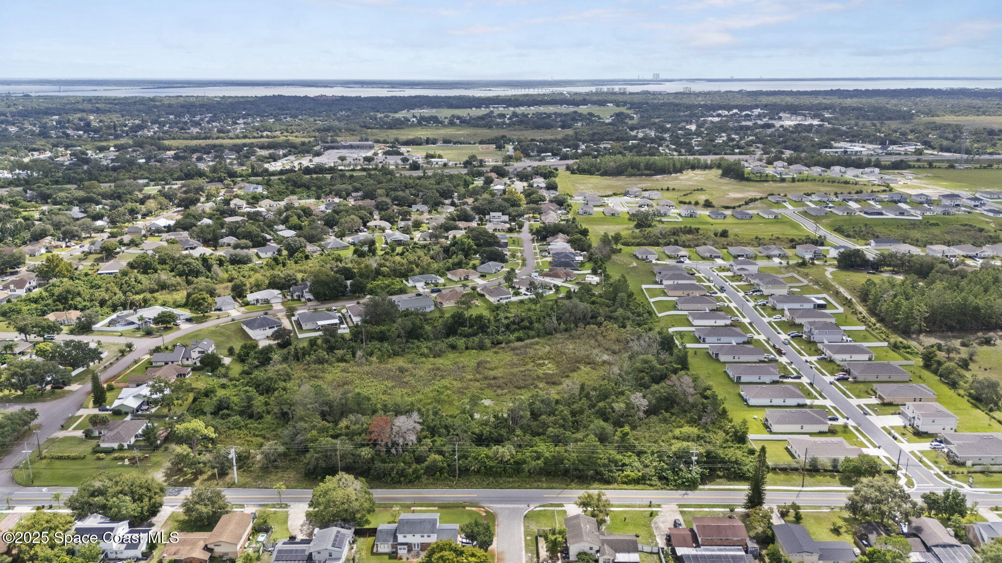 0 North Carpenter Road Titusville, FL 32796 - Photo 2 of 12 an aerial view of residential houses with city view