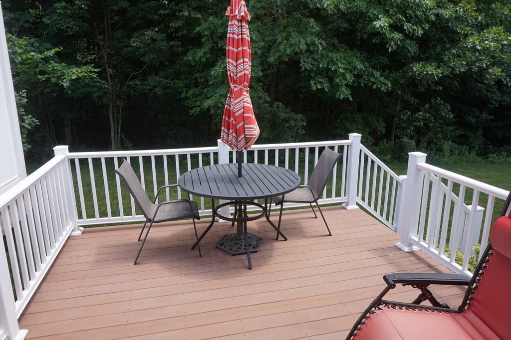 29 Riley Road, Unit 29 Lunenburg, MA 01462 - Photo 29 of 35 a view of balcony with wooden floor and outdoor seating