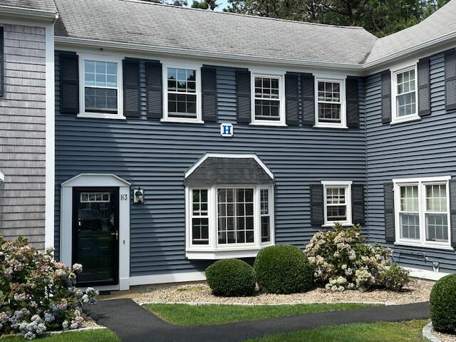 248 Camp Street, Unit H3 West Yarmouth, MA 02673 - Photo 1 of 36 a front view of a house