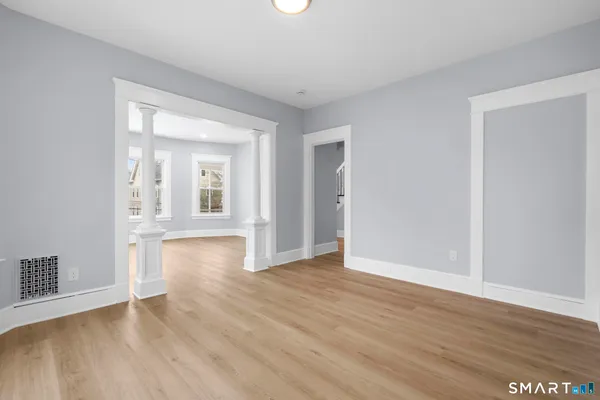 a kitchen with a sink cabinets and utility