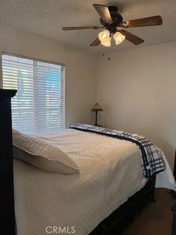 a view of a sink and a stove in a room