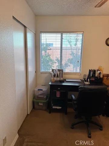 front view of a house with a patio