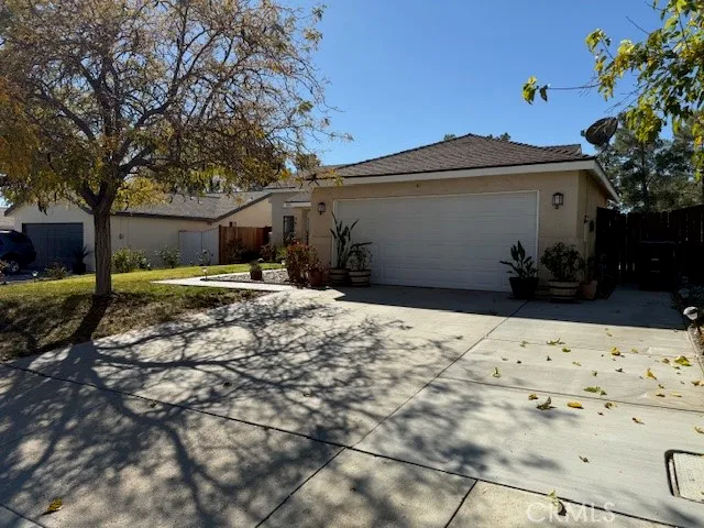 a view of a backyard of the house