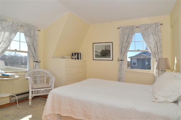68 Baileys Ledge Road Little Compton, RI 02837 - Photo 19 of 30 a bedroom with a bed and a window