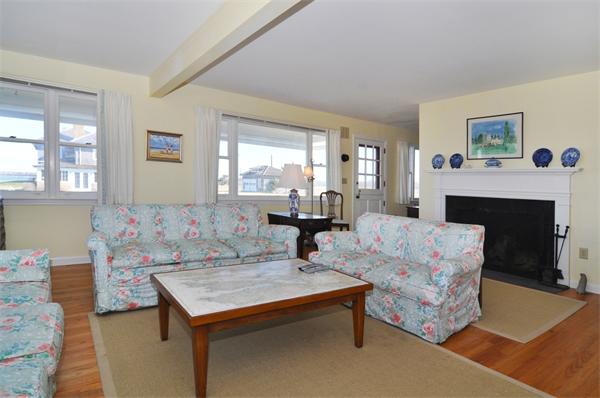 68 Baileys Ledge Road Little Compton, RI 02837 - Photo 23 of 30 a living room with furniture and a fireplace