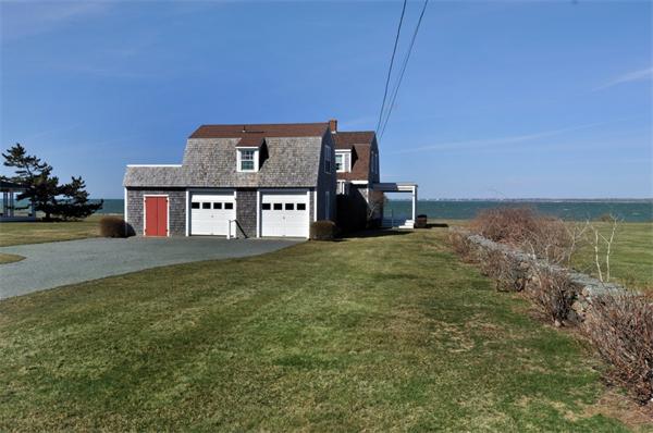68 Baileys Ledge Road Little Compton, RI 02837 - Photo 30 of 30 a front view of a house with a yard