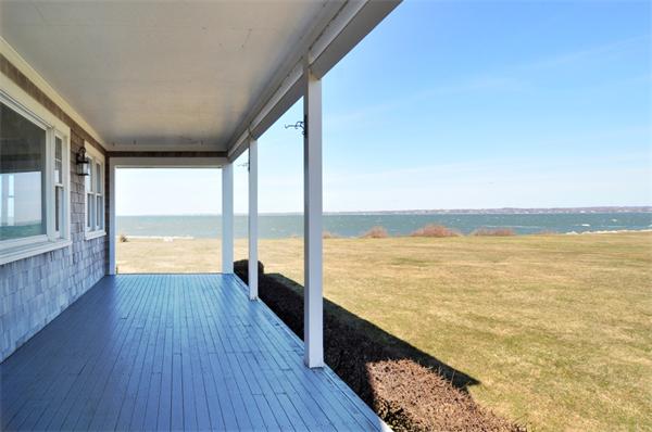 68 Baileys Ledge Road Little Compton, RI 02837 - Photo 4 of 30 a view of ocean from a balcony