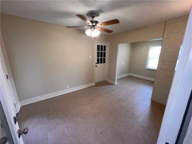 a house view with a backyard space