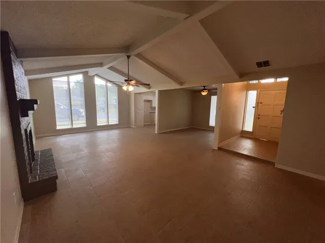 an empty room with windows