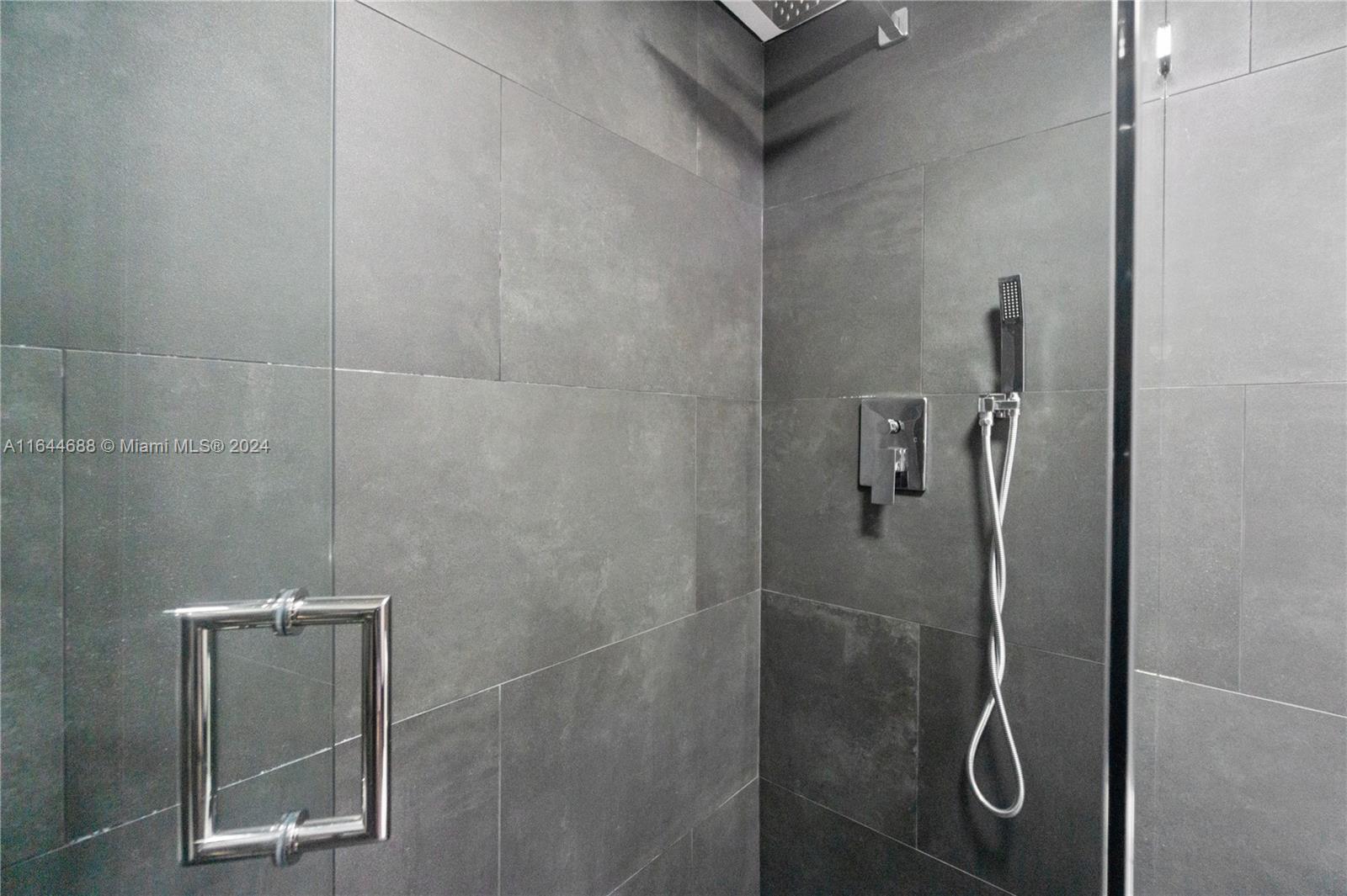 100 Lincoln Road, Unit 1104 Miami Beach, FL 33139 - Photo 13 of 24 a bathroom with a shower