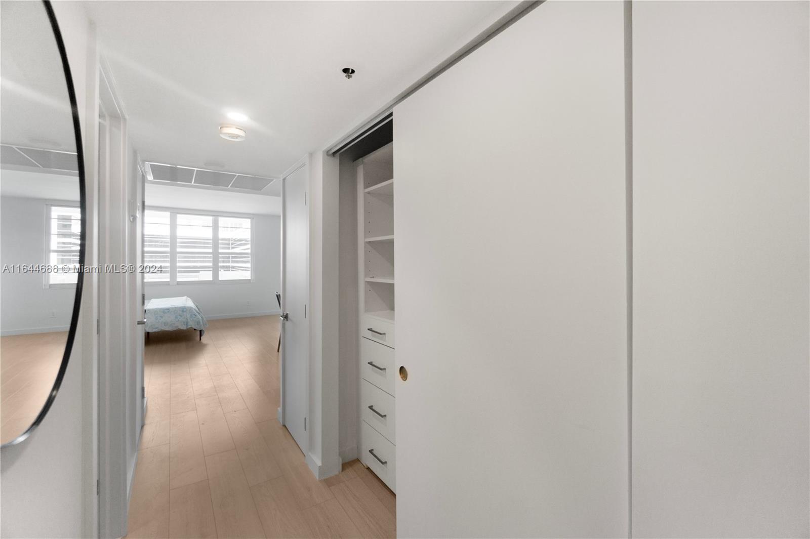 100 Lincoln Road, Unit 1104 Miami Beach, FL 33139 - Photo 9 of 24 a view of a hallway with a living room