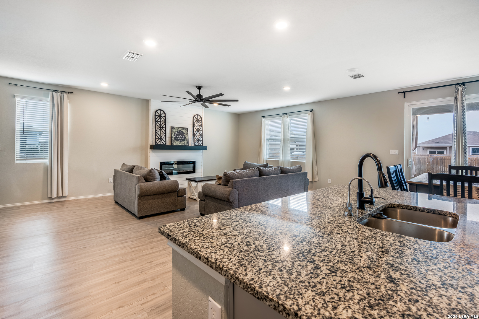 4103 Winchester Cove Converse, TX 78109 - Photo 4 of 32 a living room with furniture and a wooden floor