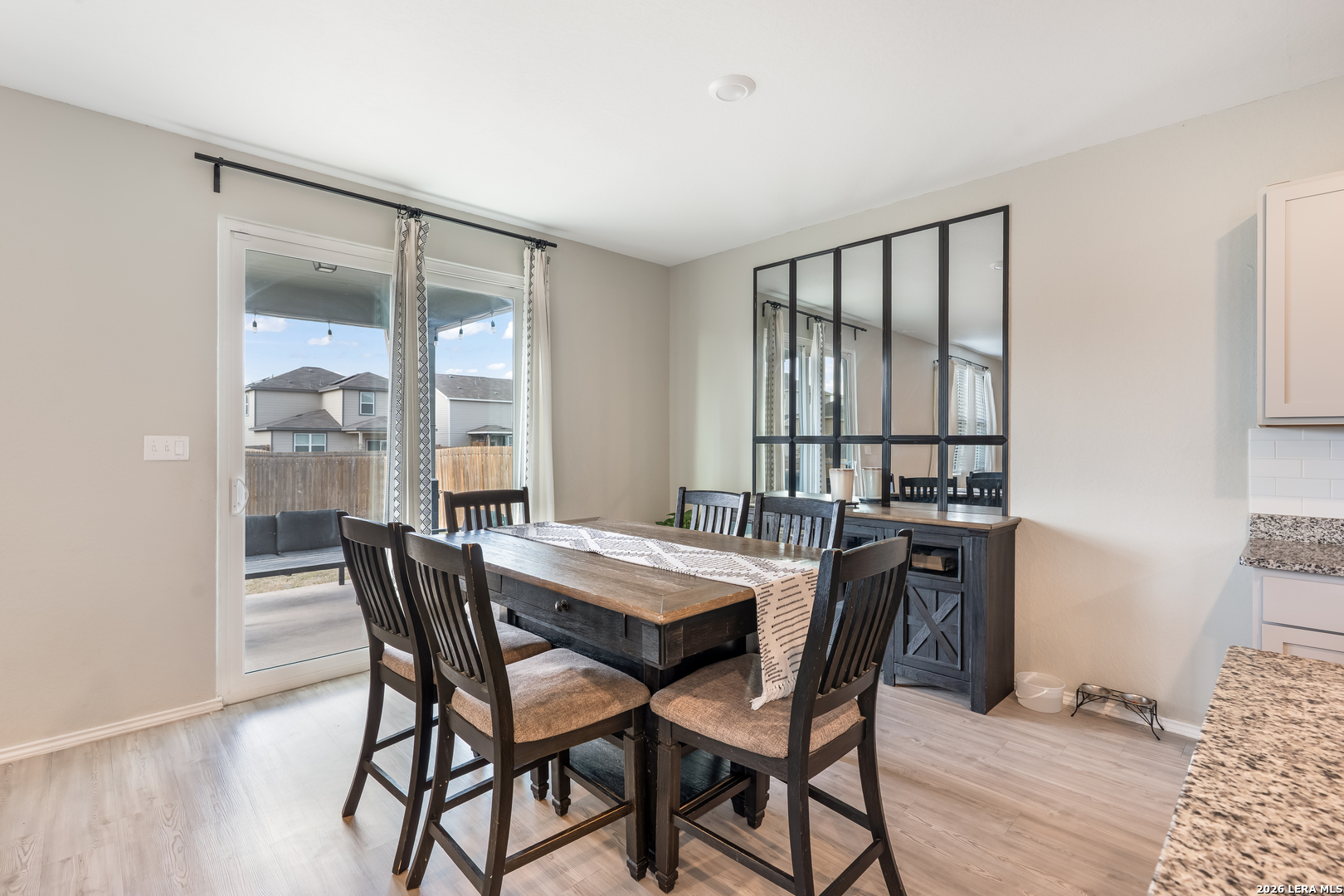 4103 Winchester Cove Converse, TX 78109 - Photo 10 of 32 a dining room with furniture and window