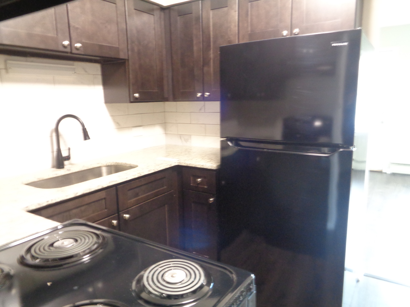 1340 North Main Street, Unit C4 Wheaton, IL 60187 - Photo 5 of 8 a close view of tap