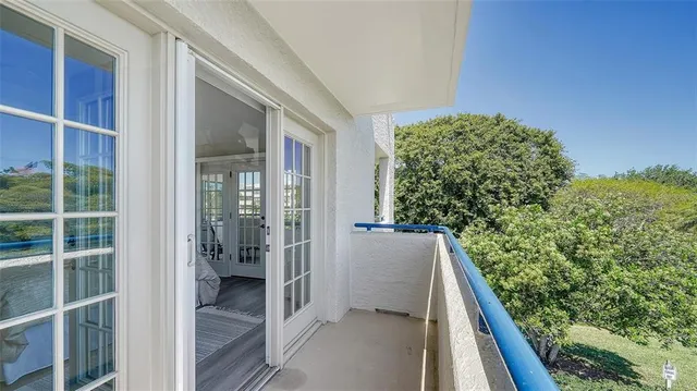 a view of a swimming pool with an outdoor space and seating area