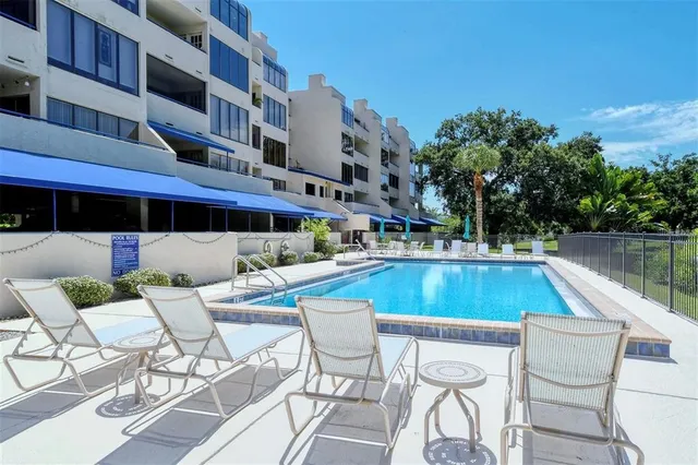 a sign that is on a wall next to a blue wall