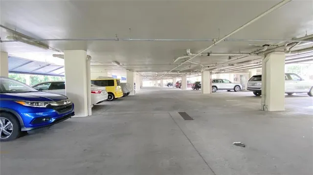 a sign that is sitting in front of a wall