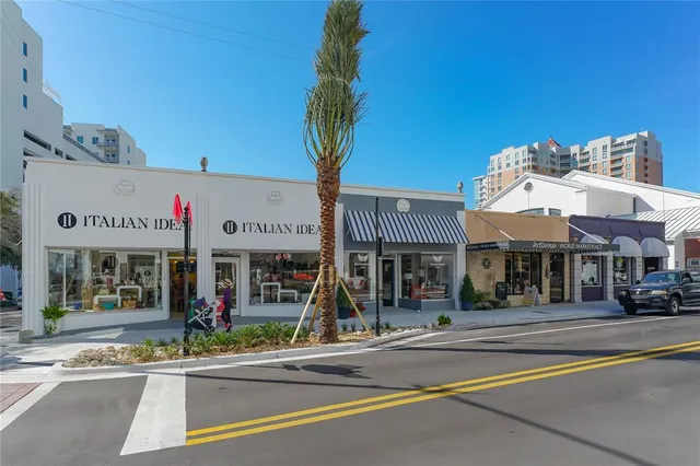 a view of street with lots of people