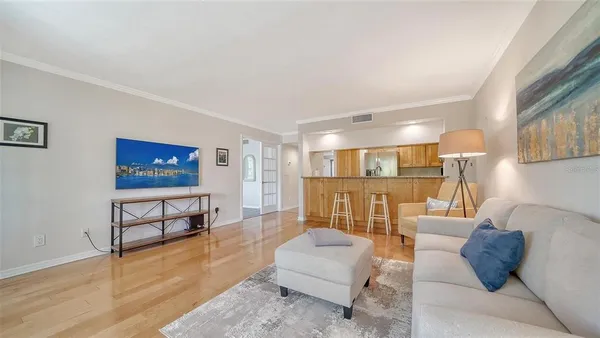 a living room with furniture and a table