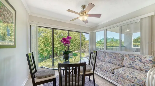 a view of a chair and table in the room