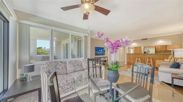 a kitchen with granite countertop a sink stainless steel appliances and cabinets