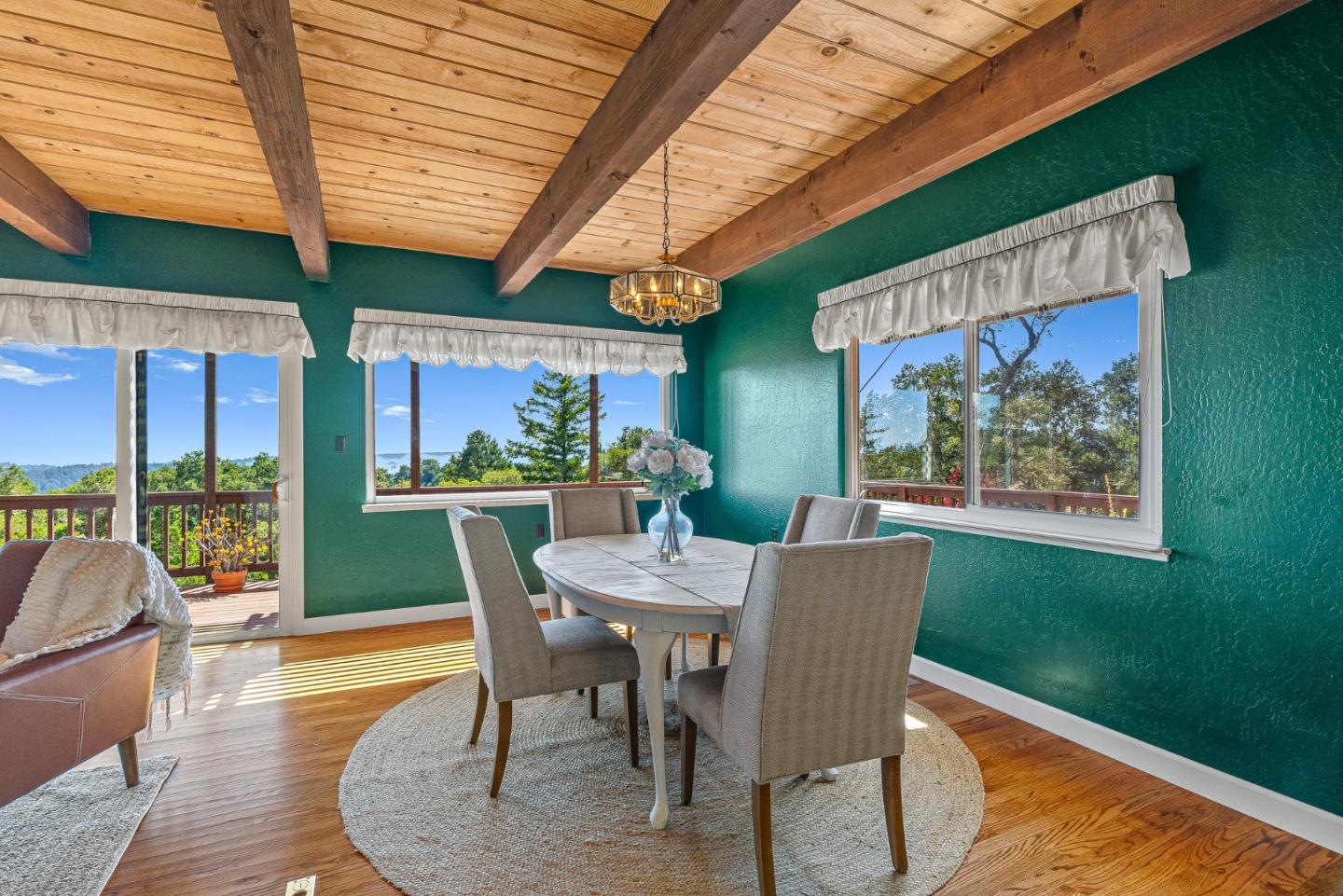 1375 Weston Ridge Road Scotts Valley, CA 95066 - Photo 24 of 68 a view of an outdoor dining space with furniture and garden view