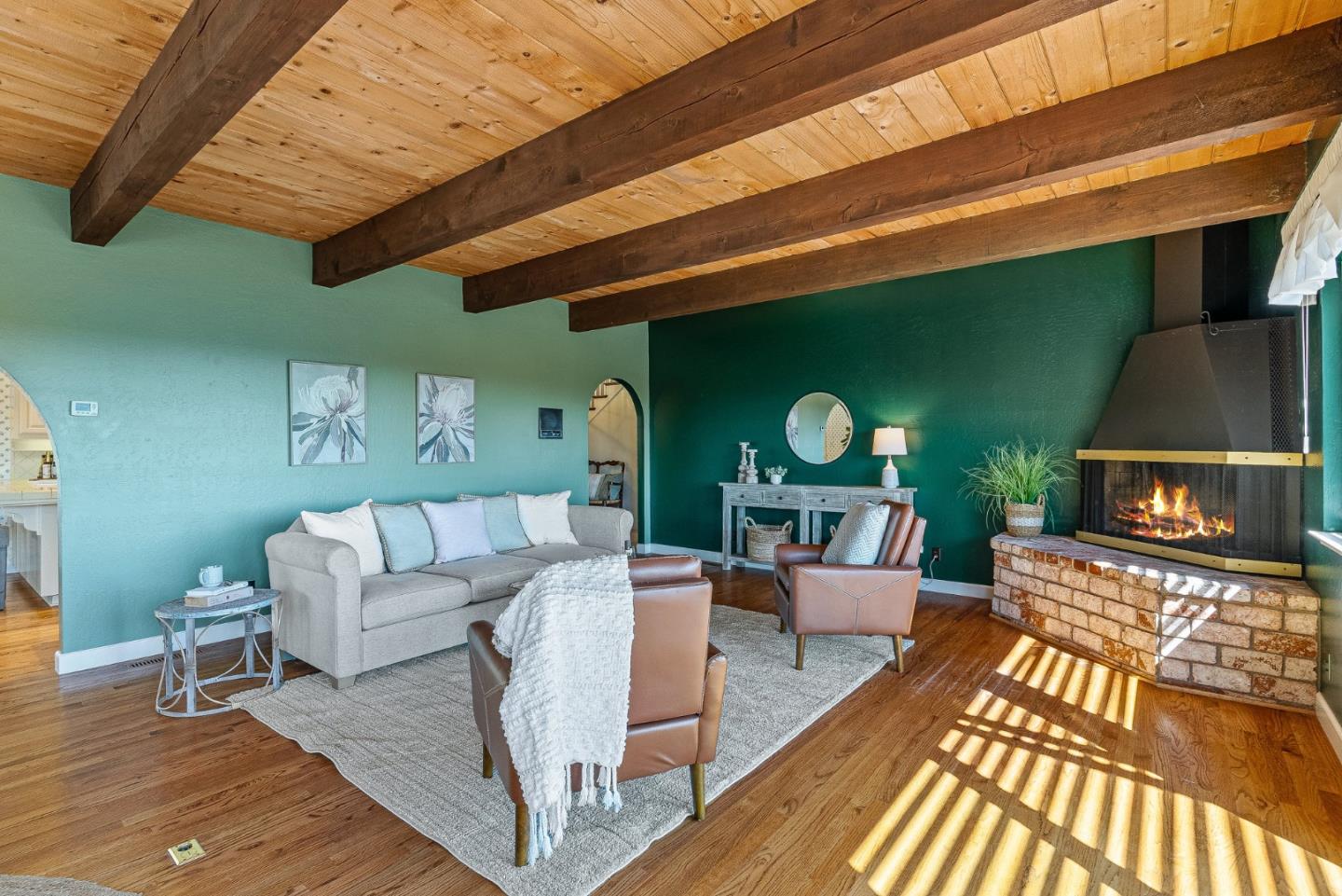 1375 Weston Ridge Road Scotts Valley, CA 95066 - Photo 25 of 68 a living room with furniture a fireplace and a table with wooden floor