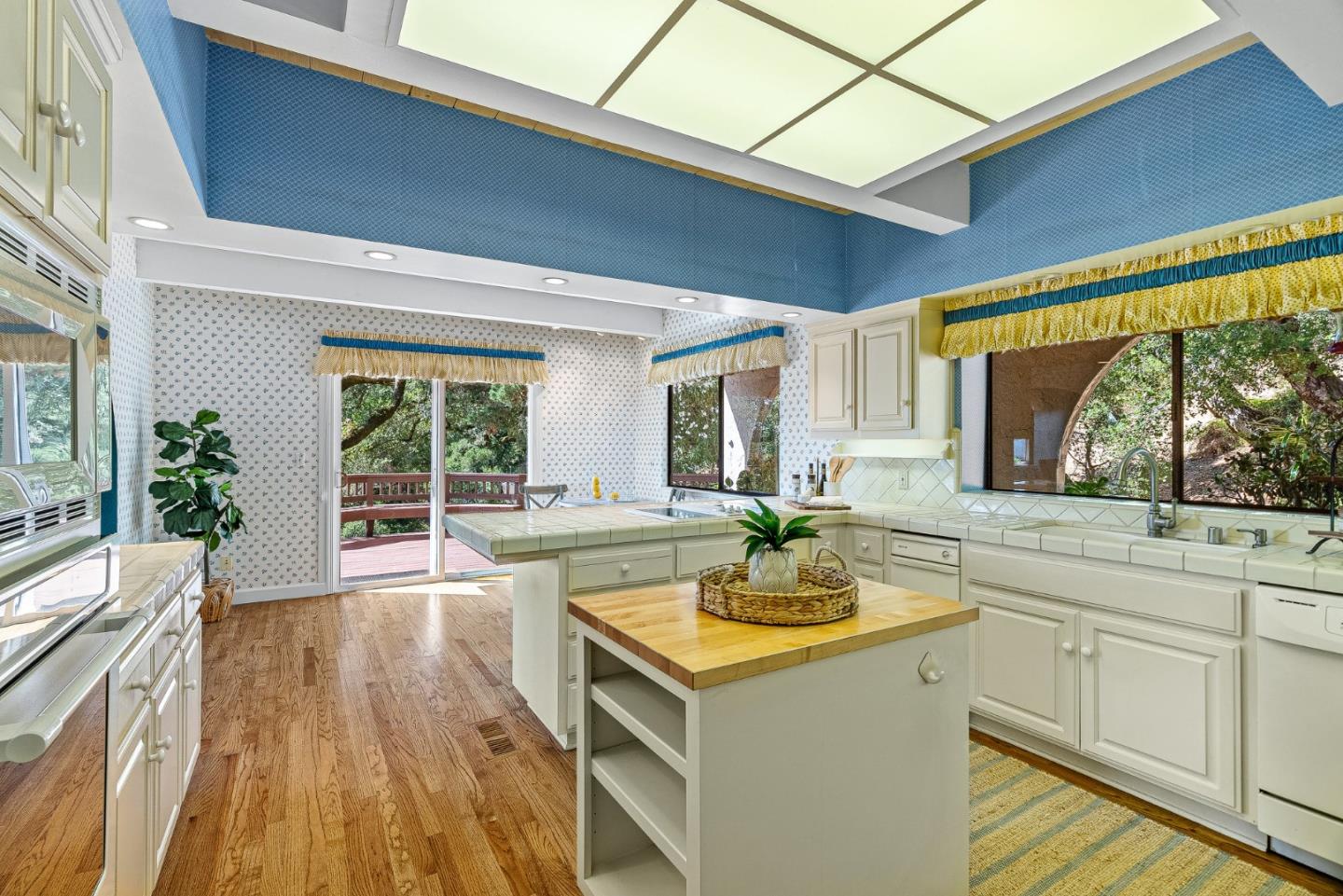 1375 Weston Ridge Road Scotts Valley, CA 95066 - Photo 35 of 68 a view of a kitchen with a sink and wooden floor
