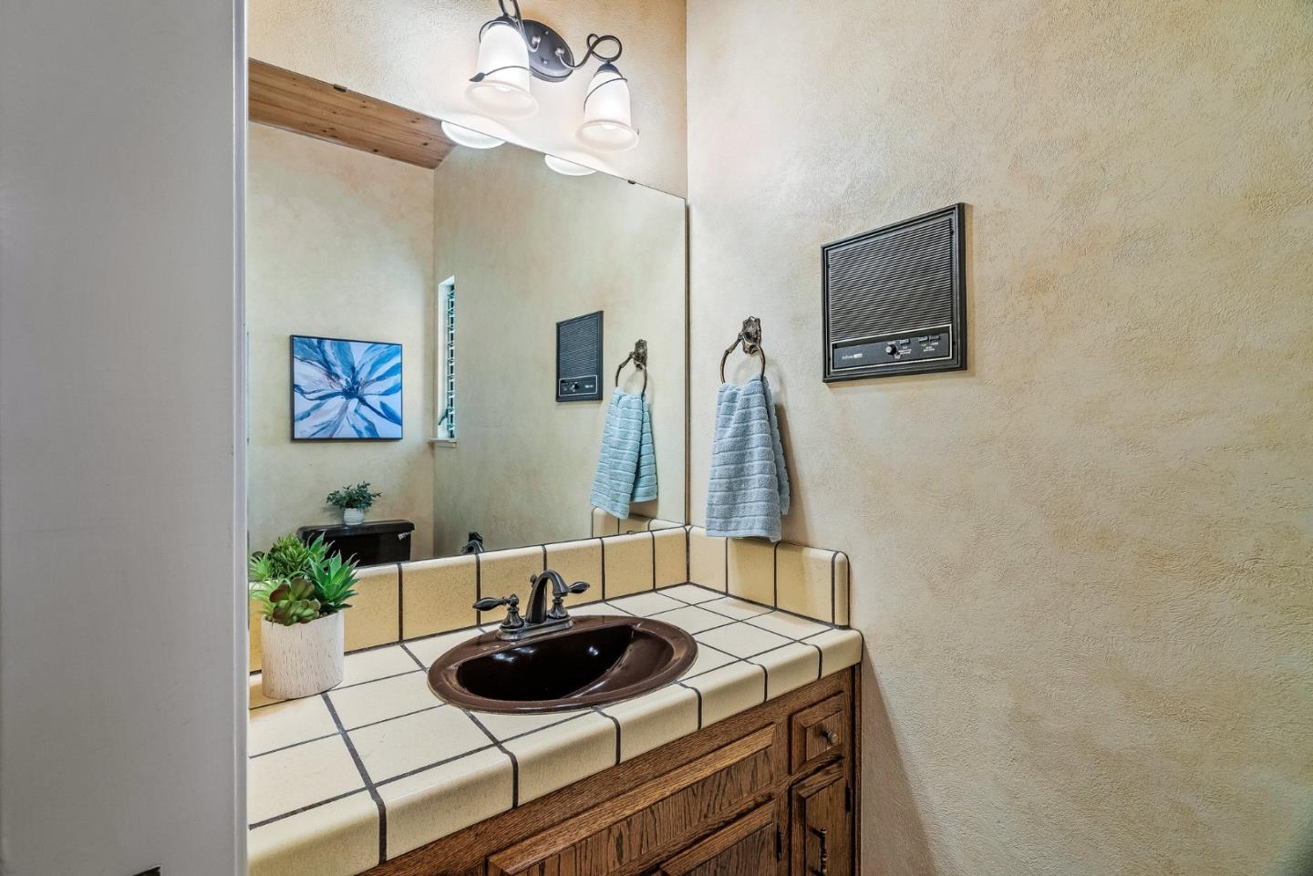 1375 Weston Ridge Road Scotts Valley, CA 95066 - Photo 41 of 68 a bathroom with a sink and a mirror