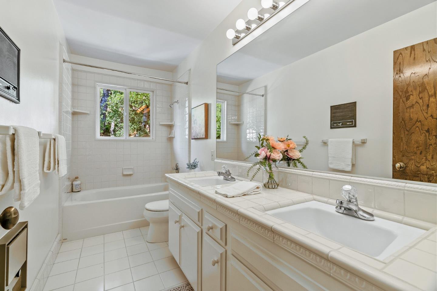 1375 Weston Ridge Road Scotts Valley, CA 95066 - Photo 42 of 68 a bathroom with a granite countertop sink mirror vanity bathtub and a toilet
