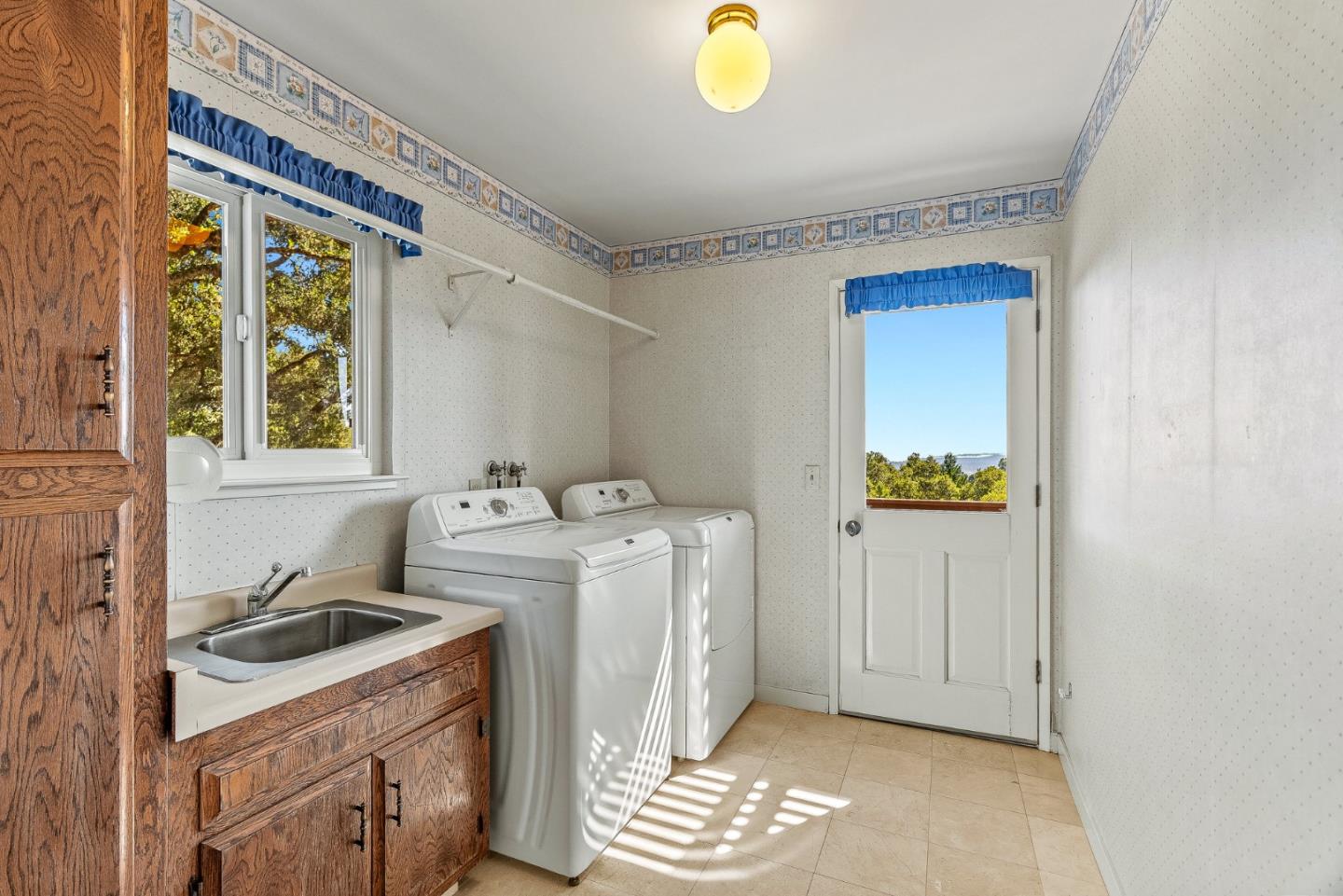 1375 Weston Ridge Road Scotts Valley, CA 95066 - Photo 45 of 68 a view of a storage and utility room with a window